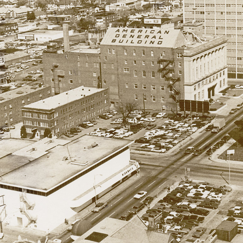 The survivor tree survives the first of many challenges – a parking lot that required the destruction of all other trees in the area. 