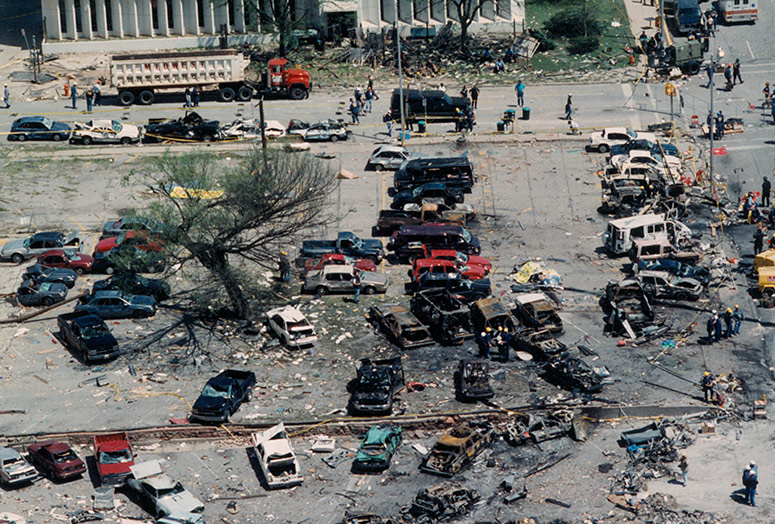 The damaged Survivor Tree among rubble and destruction shortly after the Oklahoma City bombing.