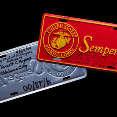 Red Marine Corps License Plate Dedicated to Sgt. Benjamin LaRanzo Davis and Capt. Randolph A. Guzman